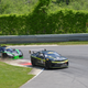 Lawson Aschenbach’s Black dog Speedshop Chevrolet Camaro Z28 leads Brett Sandburg’s ANSA Motorsports KTM X-Bow GT4